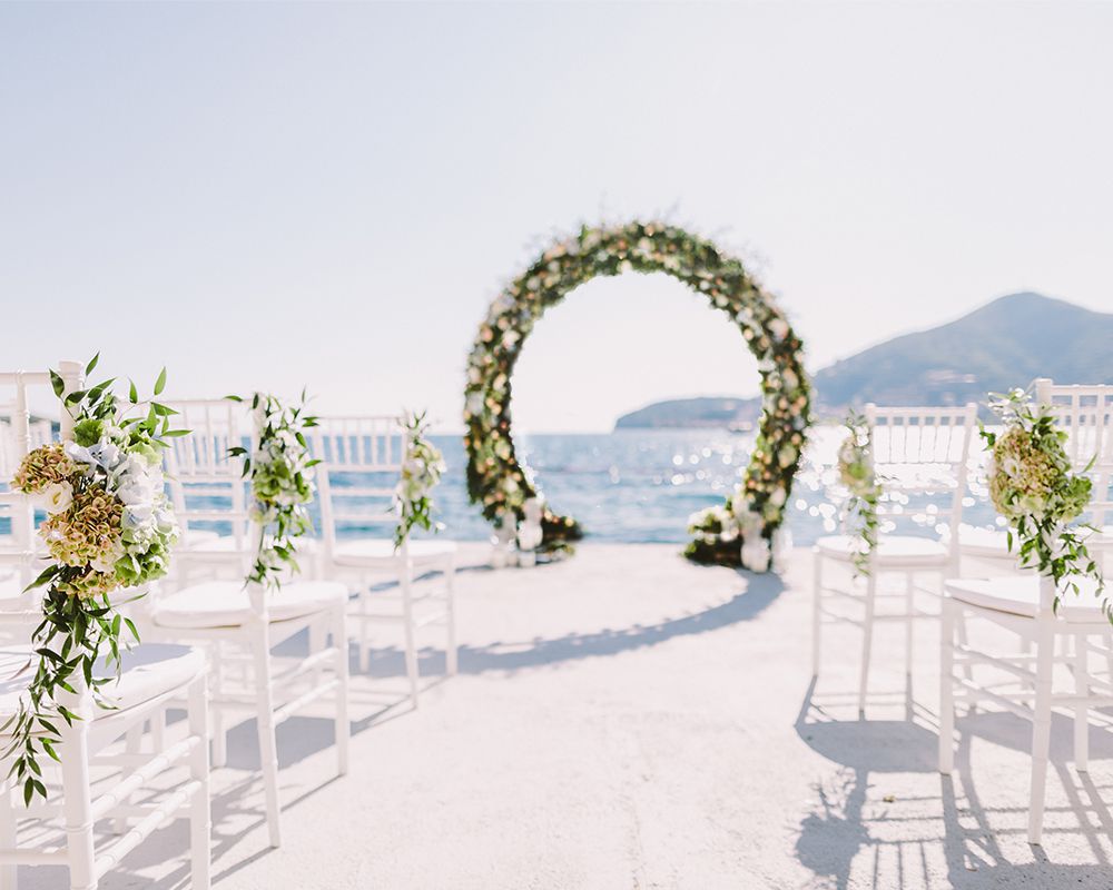 arch with flowers by the sea in Sardinia
