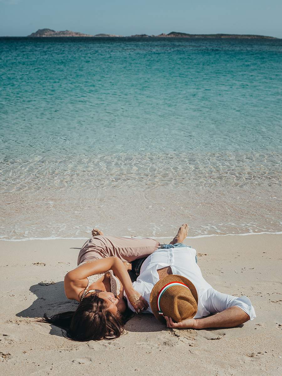 a couple on the beach in Sardinia